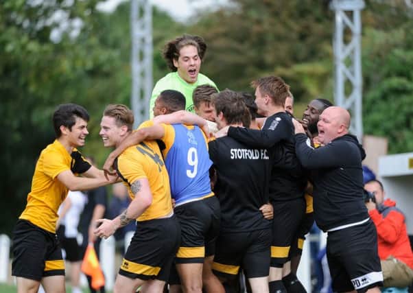 Stotfold celebrate on Saturday. Picture: Guy Wills.
