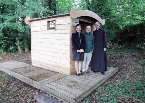 Hatley St George church compost toilet opened - from left, Councillor Bridget Smith SCDC, John Mercer from Gamlingay Community Turbine Tithe Fund and Reverend Steve Rothwell. Picture: Peter Mann.