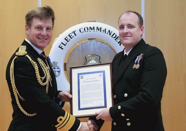 Vice Admiral Ben Key CBE presents the Fleet Commander's Commendation to former Biggleswade Sea Cadet David Smith