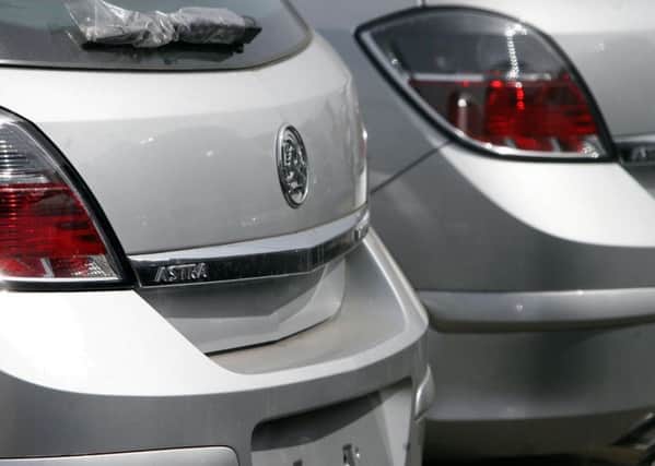 File photo dated 17/04/09 of Vauxhall Astra cars at the Ellesmere Port plant, Ellesmere Port, Cheshire. Work began on a new car plant at Ellesmere Port on Merseyside in 1961, with car production beginning there in 1964. PRESS ASSOCIATION Photo. Issue date: Friday May 29, 2009. See PA story INDUSTRY Vauxhall History. Photo credit should read: Peter Byrne/PA Wire B21648981243540505A