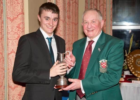 Harry Warmoth, John O'Gaunt GC Golfer of the Year with Richard Aubigne, Club Captain. PNL-170103-144943002