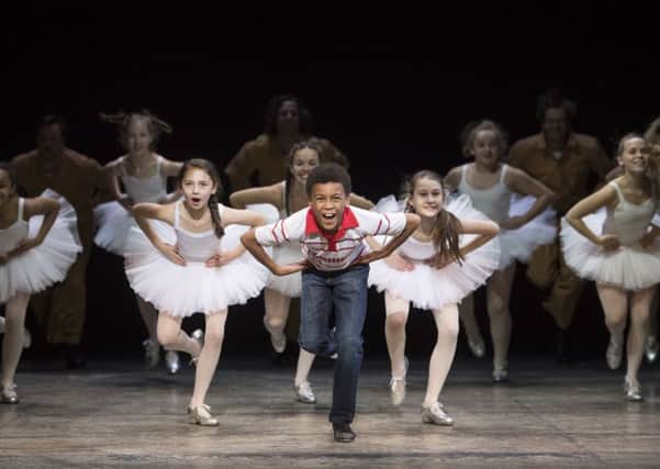 Emile Gooding as Billy Elliot with the ballet girls. Picture by Alastair Muir PNL-171005-162151004