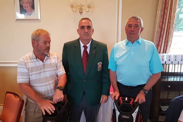 John O'Gaunt GC Senior Mens Open winners John George and S Steel with Dave Wilsher, Club Captain, centre. PNL-170908-153720002
